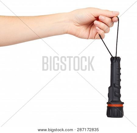 Hand With Black Led Flashlight, Compact Lighting For Travel.