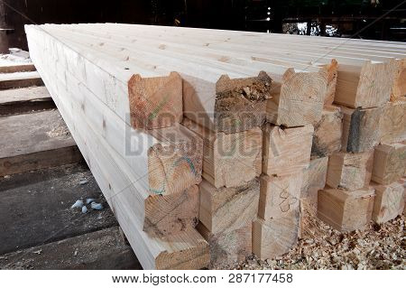 Wood At The Sawmill. Lumber Is Stored In The Warehouse.