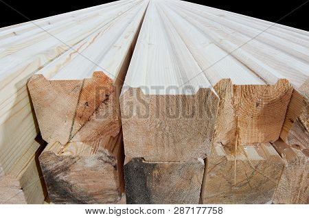Wood At The Sawmill. Lumber Is Stored In The Warehouse.