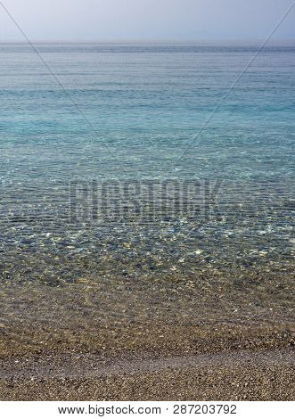 Waves On The Greek Island Evia (euboea) In The Aegean Sea