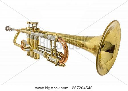 Old Golden Rusted Trumpet With Dents And Scratches Isolated On White