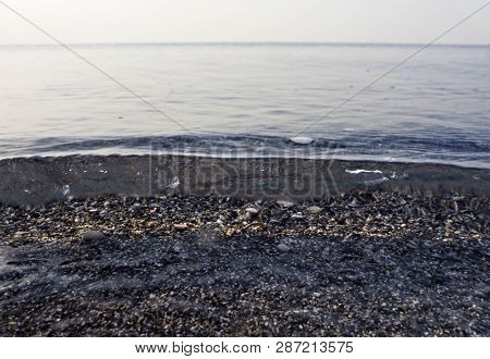 Waves And Beautiful Sunset On The Greek Island Evia (euboea) In The Aegean Sea