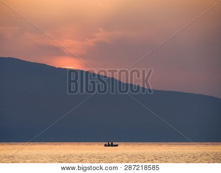 Waves And Beautiful Sunset On The Greek Island Evia (euboea) In The Aegean Sea
