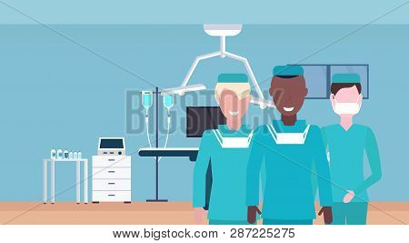 Medical Doctors Team In Uniform Standing Together Hospital Operating Table Modern Clinic Surgery Ope