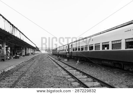 Thazi, Myanmar - 23 November, 2018: Black And White Picture Of Train And Rails At Thazi Train Statio