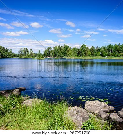 Beautiful Landscape With Lake And Clouds. Vuoksa Lake - A Picturesque Lake In Leningradskaya Oblast,