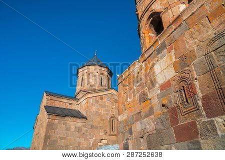 Gergeti Trinity Church In The Mountains Of The Caucasus