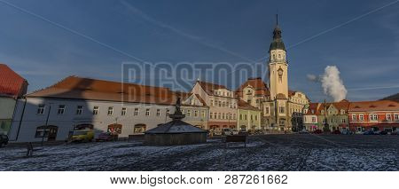 Sunny Cold Winter Morning On Main Old Square In Bilina Town In North Bohemia