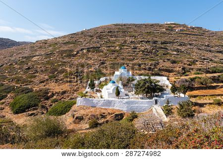 White Churches With Blue Domes In The Cemetery Under Kastro Of Sifnos. Cyclades, Greece