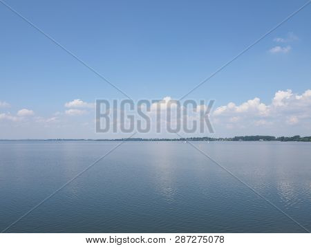 Scenic Landscapes Of Artificial European Goczalkowice Reservoir In Poland With Beauty Clouds On Blue