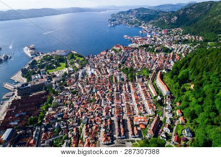Bergen is a city and municipality in Hordaland on the west coast of Norway. Bergen is the second-largest city in Norway. The view from the height of bird flight. Aerial FPV drone flights.