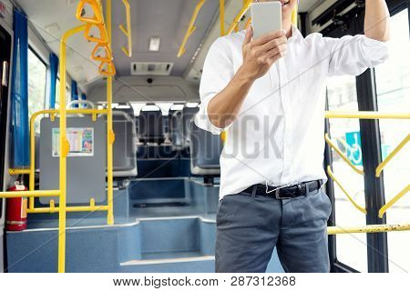 Young Businessman Passenger Use Time In The Bus