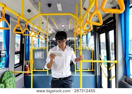 Young Businessman Passenger Use Time In The Bus