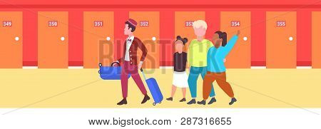 Mix Race Tourists Family With African American Bellboy Carrying Luggage To Guest Room Hospitality St