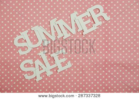 Summer Sale Alphabet Letters With Spce Copy On Pink Polka Dot Background