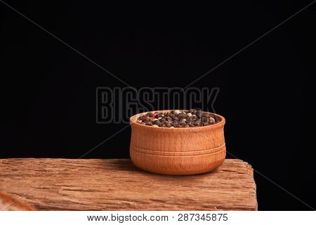 Bowl Of Various Pepper Peppercorns Seeds Mix On Table Rastic Style Background