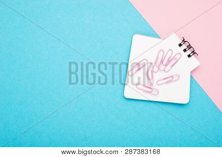 Empty Notebook Or Notepad On Pink And Blue Background With A Double Color Stationery. Creative Minim