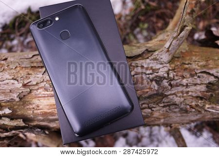 Modern Mobile Phone With Large Screen, Close-up And Assembly Details
