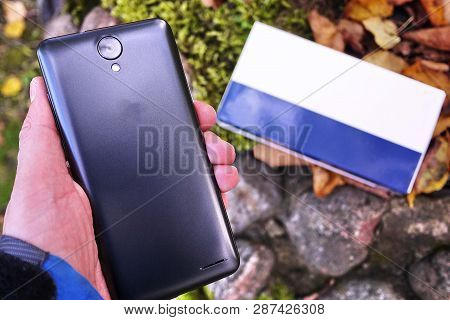 Modern Mobile Phone With Large Screen, Close-up And Assembly Details