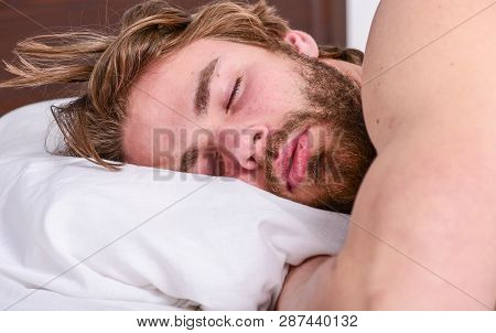 Get Adequate And Consistent Amount Of Sleep Every Night. Expert Tips On Sleeping Better. Bearded Man