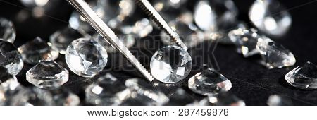Scattering Of White Star Diamonds On Black Background Table Jeweler Concept