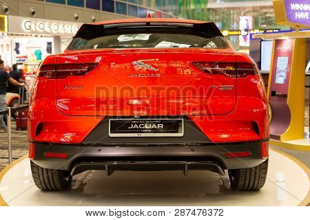 Singapore. March 2019. Orange Jaguar I-pace All Electric Suv. Taillights. Trunk Door And Rear Camera