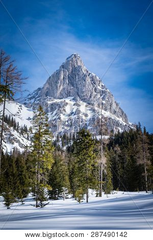 Portrait View Over Snowy Plateau Kaiserau With Mountain Admonter Kalbling On A Sunny Winterday In St
