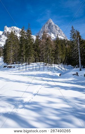 Portrait View Over Snowy Plateau Kaiserau With Mountain Admonter Kalbling On A Sunny Winterday In St