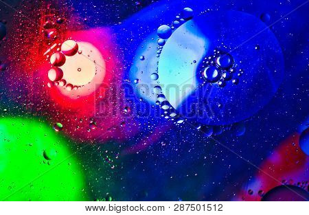Multcolored Rgb Red Green Blue Lights Through Oil Bubbles Abstract Liquid Detail