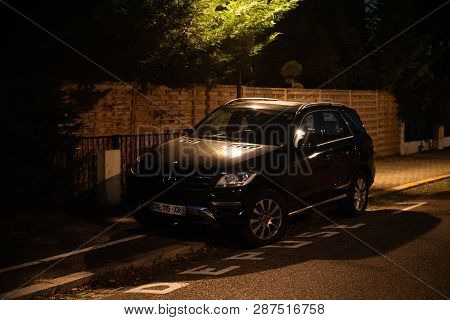 Strasbourg, France - Oct 13, 2018: French Street At Dusk With New Mercedes-benz Ml Suv Black Color
