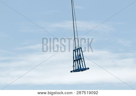 Gosford, New South Wales, Australia - January 31, 2019: Tower Crane Unloading A Cradle From New Home
