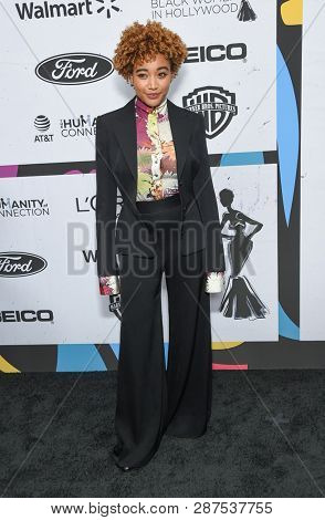 LOS ANGELES - FEB 21:  Amandla Stenberg arrives for the Essence Celebrates Black Women in Hollywood on February 21, 2019 in Beverly Hills, CA