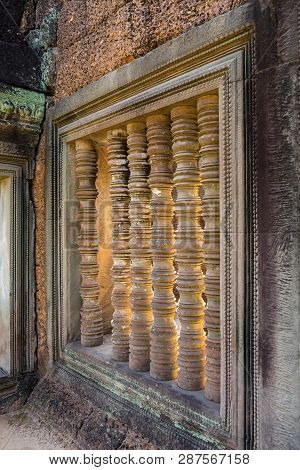 Stone Pillar Window Decor In Banteay Samre Temple In Cambodia