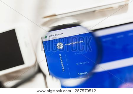 New York, Usa - 6 March 2019: General Electric, Ge Official Website Homepage Under Magnifying Glass.