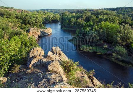 View Of  Southern Bug River  And  Rocks And On Sunny Day In  Reserve Buzsky Gard, Migeya, Mykolaiv R
