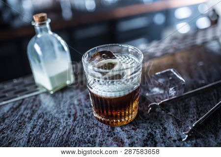White Russian Cocktail Drink At Barcounter In Night Club Or Restaurant.
