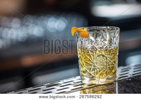 Cocktail Drink Old Fashioned At Barcounter In Night Club Or Restaurant.