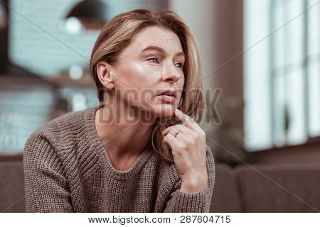 Depressed Woman Feeling In Despair After Fight With Husband