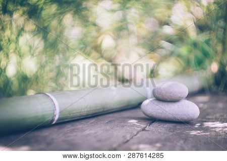 Spa Background With Woman's Hands And Clear Water On An Old Wooden Table. Japanese Style. Simplicity