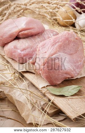 Raw Pork Meat - Carbonade, Fillet Or Loin. Fresh Meat And Ingredients. Rustic Style.