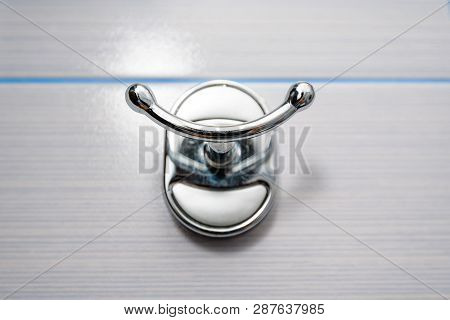 Stainless Steel Towel Hanger On Wall In Bathroom