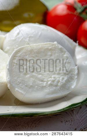 Balls And Pieces Of Buffalo Mozzarella, Soft Italian Scheese Made From The Milk Of Italian Mediterra