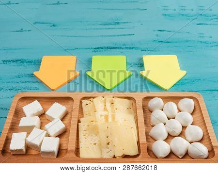 Cheese Compartmental Dish With Different Cheeses, On Rustic Wooden Background. Mock Up