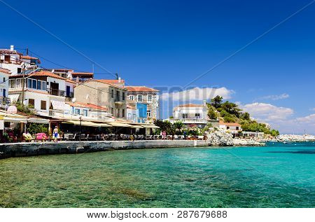 Samos Island, Greece - May 23, 2017: The Picturesque Village Of Kokkari With Traditional Houses And 