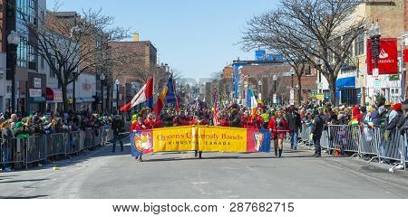 Boston, Usa - Mar. 18, 2018: Queen`s University Bands March In Saint Patrick`s Day Parade In Boston,