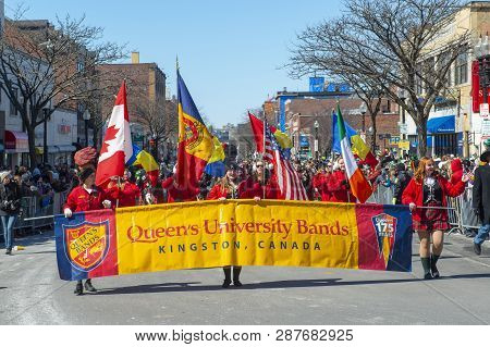 Boston, Usa - Mar. 18, 2018: Queen`s University Bands March In Saint Patrick`s Day Parade In Boston,
