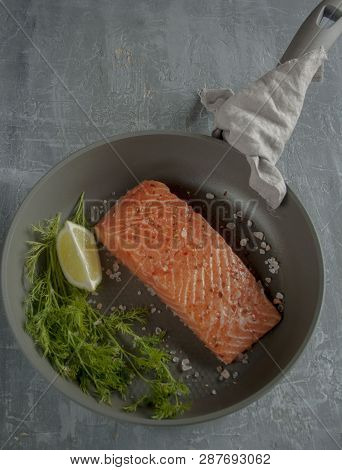 Salmon With Seasoning Lemon And Dill In A Pan