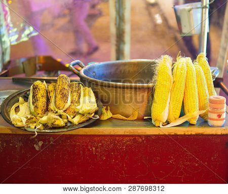 Barbecued Cooked Corn And Sale Of Boiled Corn. The Popular Street Food In Turkey