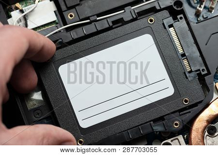 Installing New Solid-state Drive To Laptop Pc. Sata And Power Connection Close Up.upgrade Laptop Har