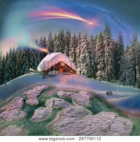 Climbing To Tourist Wild Alpine Mountain To An Abandoned Cabin-in Order To Illuminate The Snow-cover
